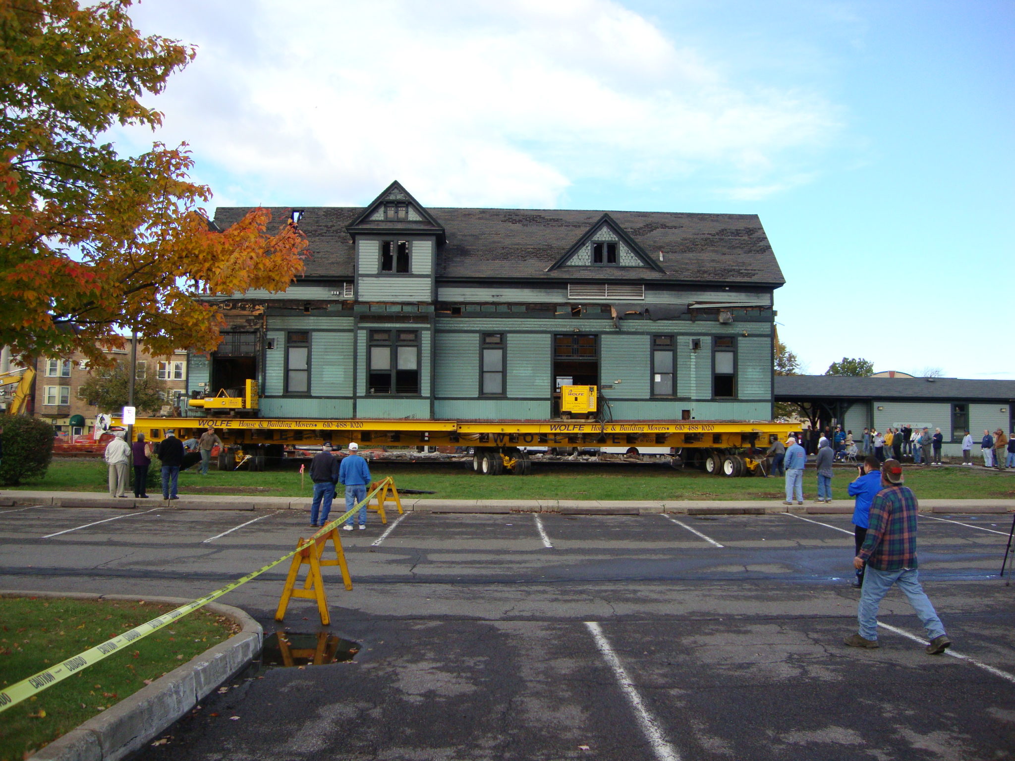 Dansbury depot raised on dolly prepared for its move.