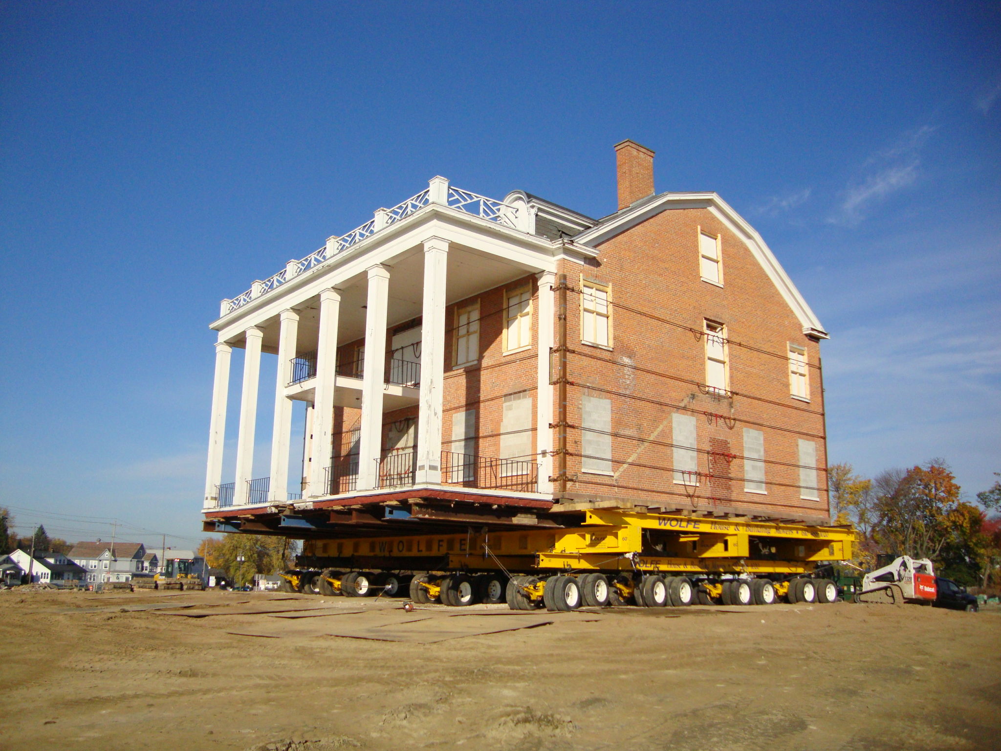 Ingersoll Mansion raised on dolly view of how large pillars supporting third floor balcony.