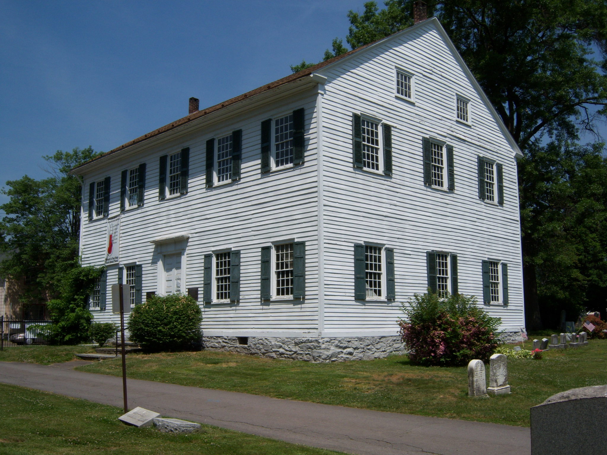 Historic two story church prior to construction.