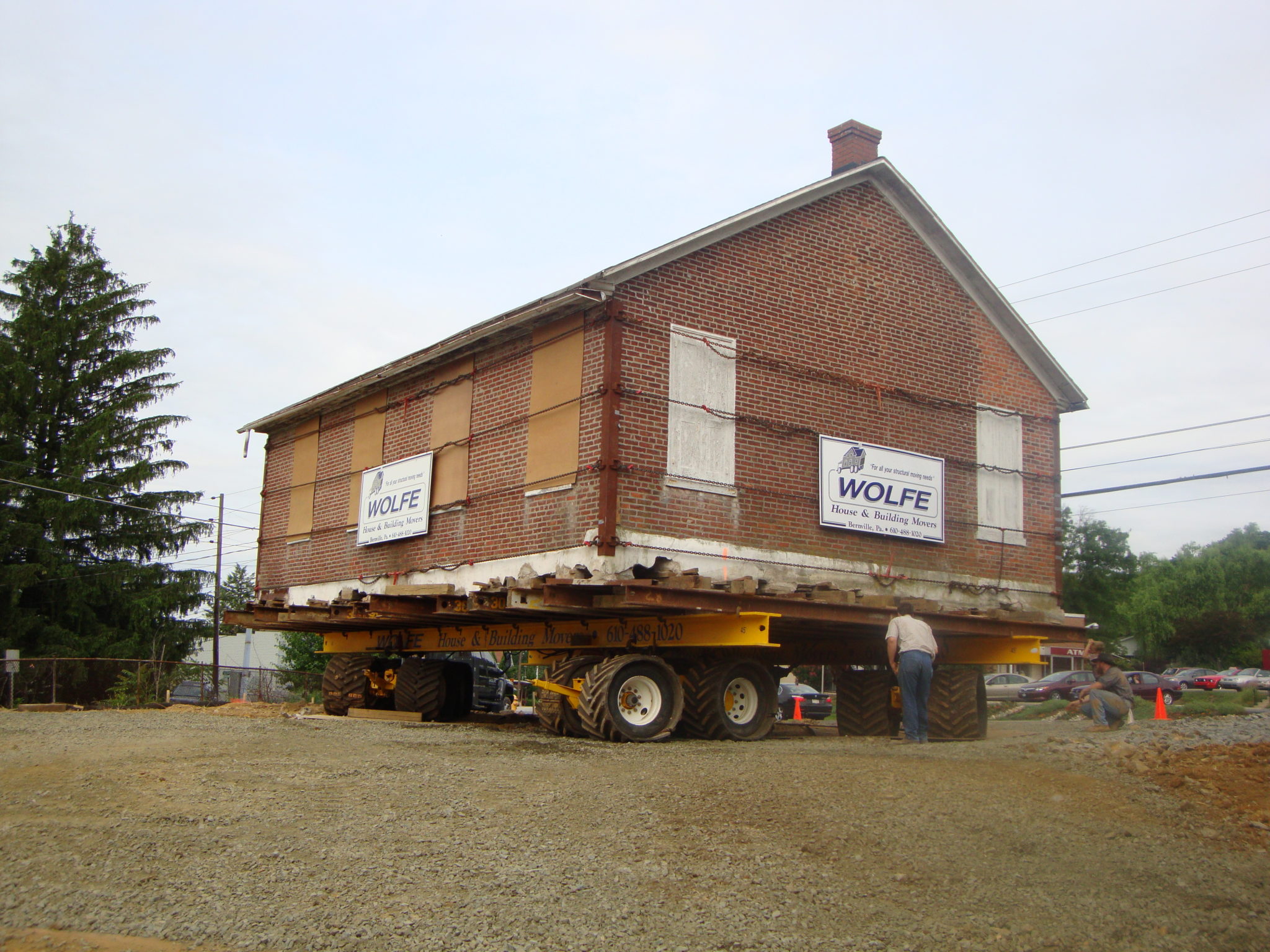 19th Century Schoolhouse raised on dolly with cable bracing.