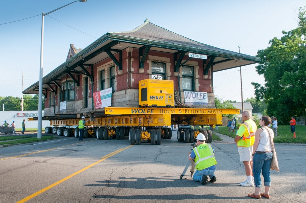 At 8:00 AM the Depot begins the 3/4 Mile Journey to its new home. The SmartSteer system expertly makes the first turn.
