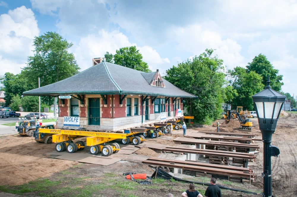 After breaking for lunch, each Dolly is rotated 90 degrees in preparation to move the Depot across the new foundation.