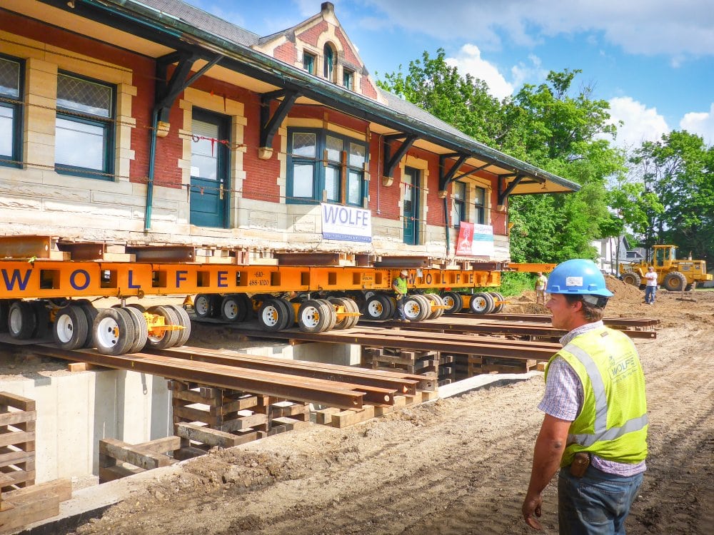 Constant measurements and adjustments are made as the depot moves at a crawl of only a few inches per minute.