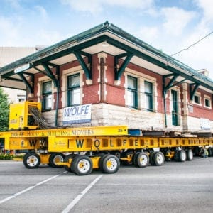Sturgis Railroad depot, on a dolly, turning onto a street.