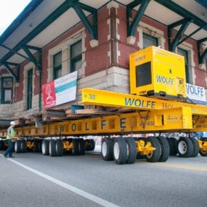 Sturgis Railroad depot, on a dolly, moving down a road.