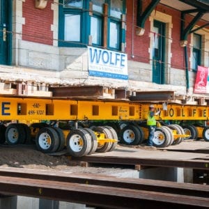 Stergis railroad depot on a dolly inching into place onto its new foundation.