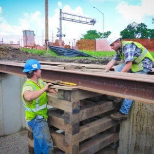 Workers preparing supports at a new foundation.