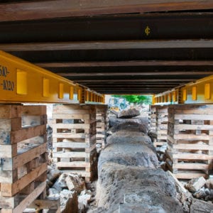 Building lifted 7' and supported on 12 crib piles.