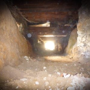 Interior view of a tunnel excavated under a building.