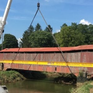 Herrs-mill-bridge- with crane suspending beam next to it.