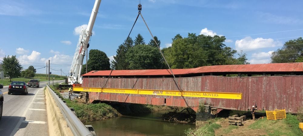 Herrs-mill-bridge- with crane suspending beam next to it.