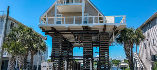 carolina beach house raised about 30 feet off ground on supports.