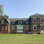 Brick Carriage Houses Before Center Section is Demoed