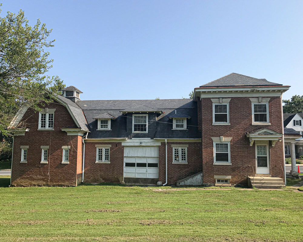 Brick Carriage Houses Before Center Section is Demoed