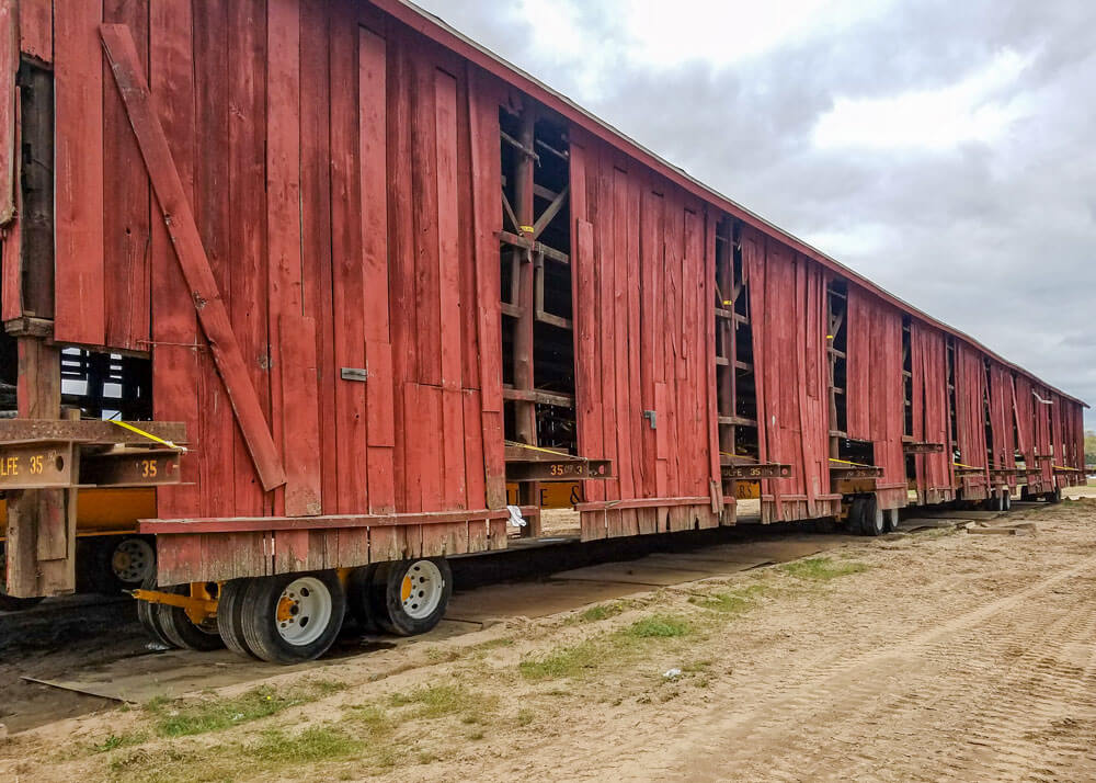 Wolfe moves a wood frame tobacco barn