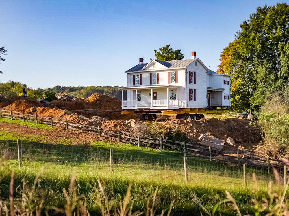 Virginia farmhouse sits on dollies ready to move to new location