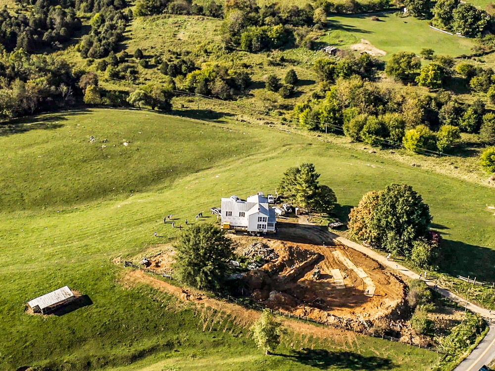 Aerial view of Virginia farmhouse moving away from original location