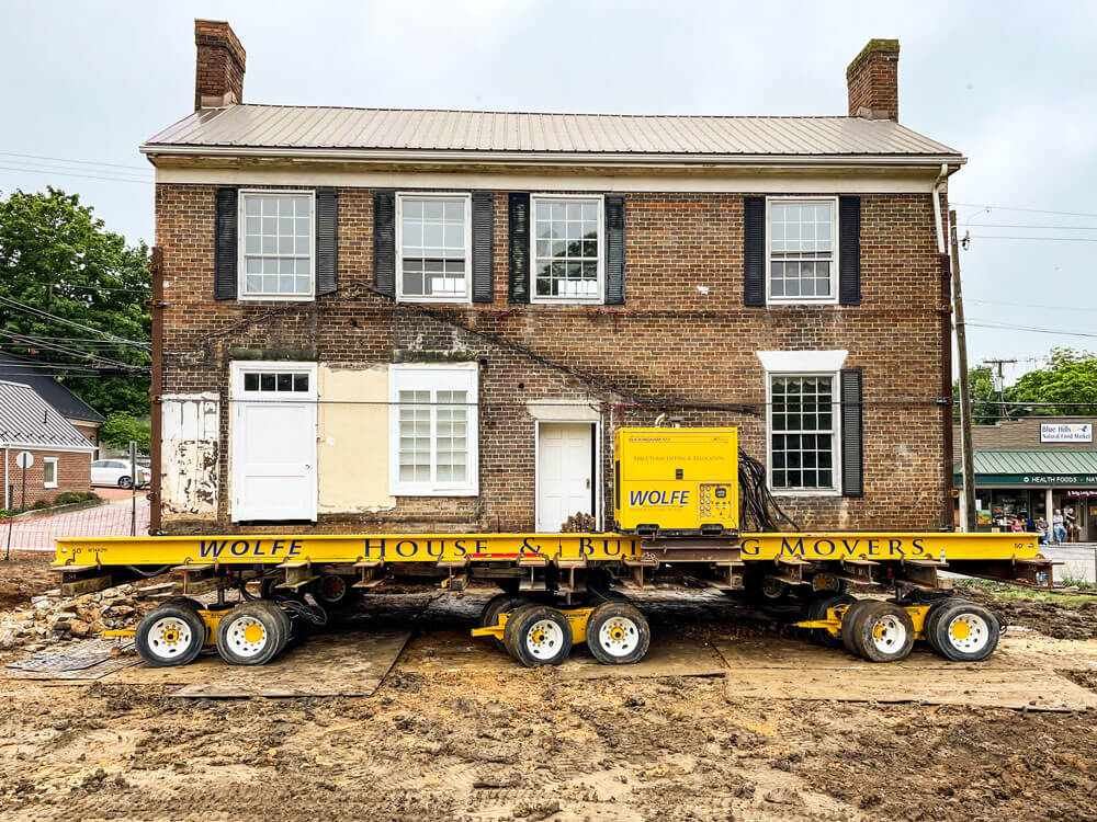 Dooley House sits on dollies ready to be moved