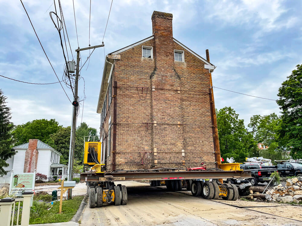 Dooley House drives down road to new location