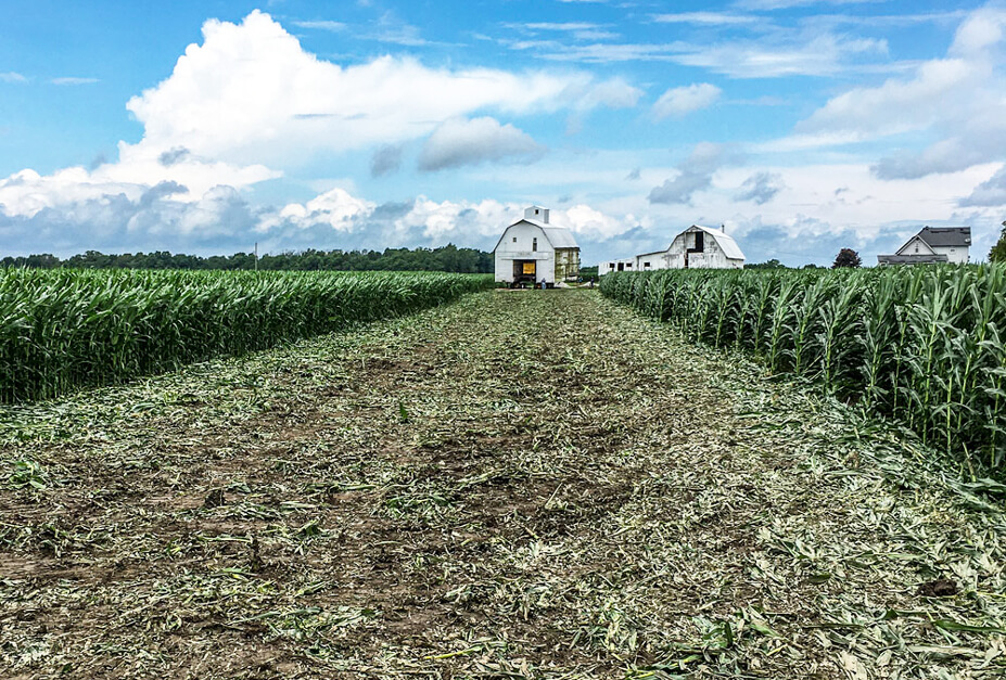 Drive-Through Barn Being Relocated Through Fields