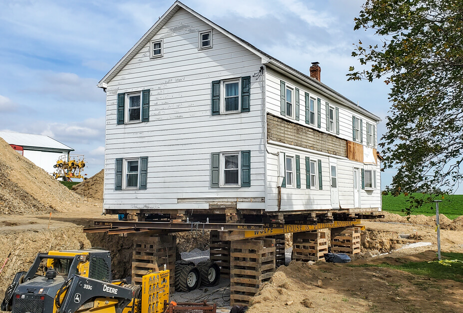 Frame Farmhouse Over New Footers