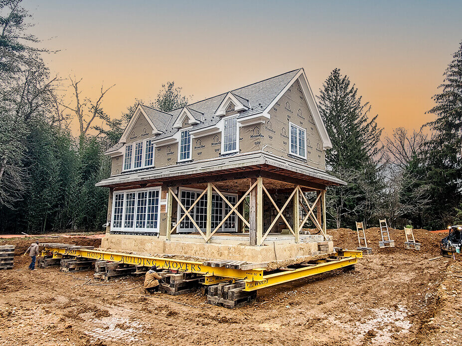 Pool house sits on beams ready for rotation