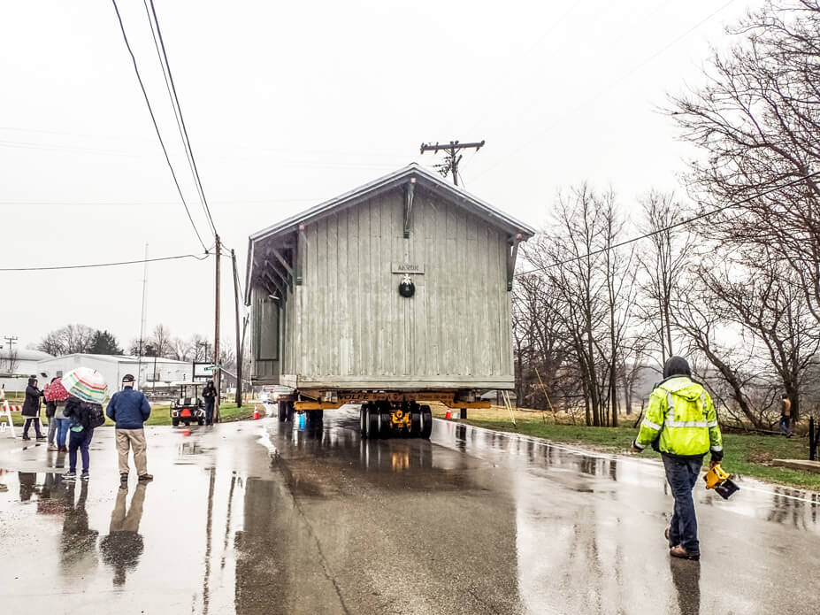 Akron depot travels through town to new location