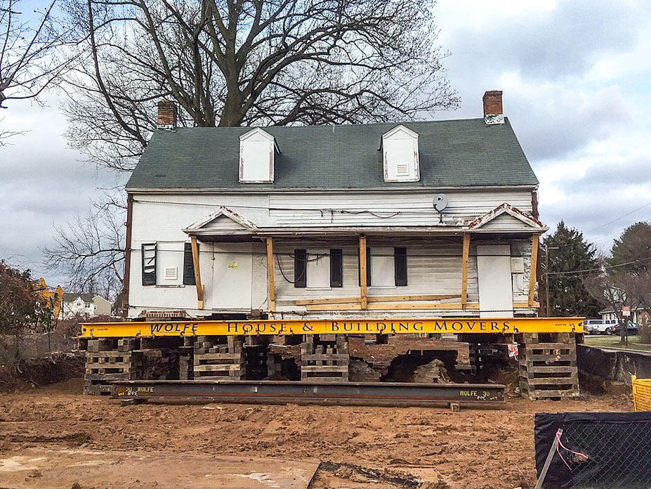 Mill House sits on crib prior to relocation