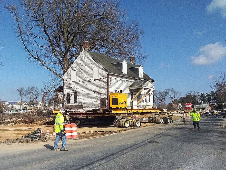 Wolfe drives mill house onto road