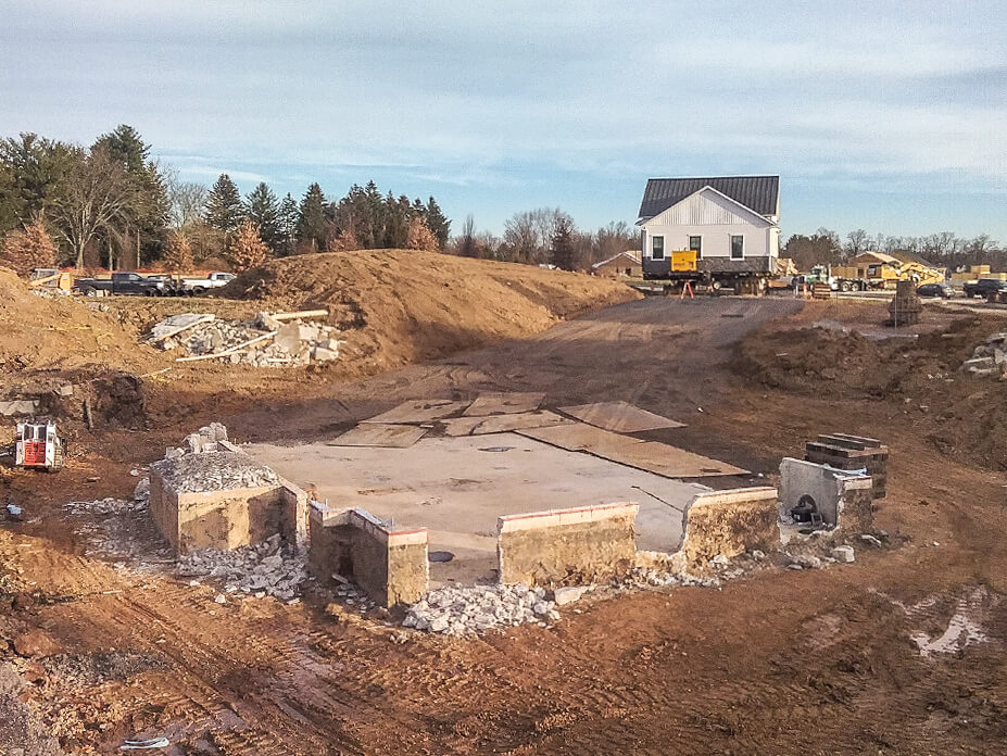 New foundation with sales center in background