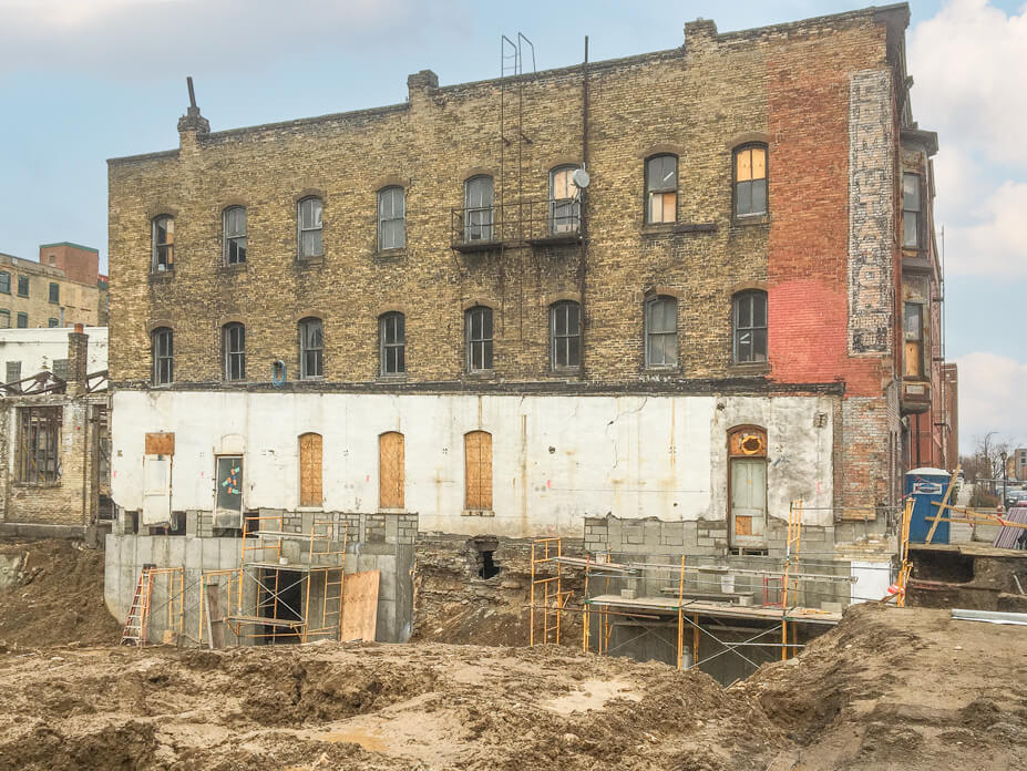 The new foundation wall under the brick after the support steel has been removed