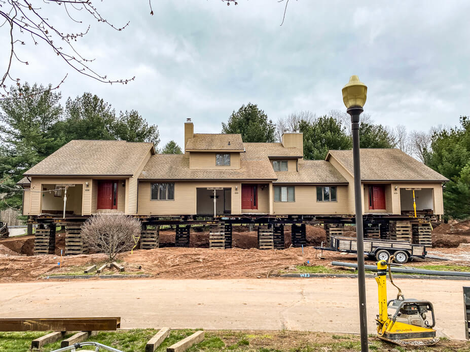 CT condominiums are lifted for foundation replacement 