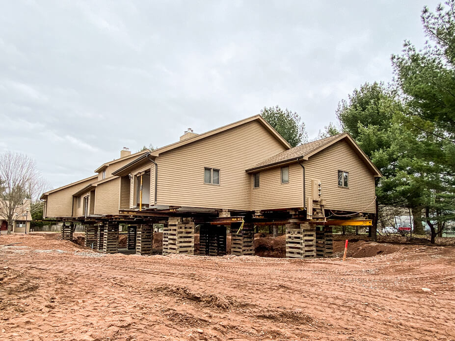 End view of CT condominiums lifted on crib piles