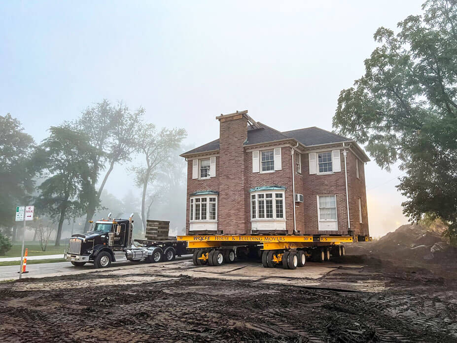 Indiana Landmarks May House sits on dollies ready to be moved.