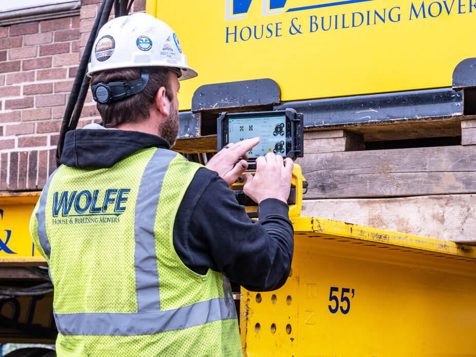 Wolfe foreman sets up SmartSteer® System for dollies