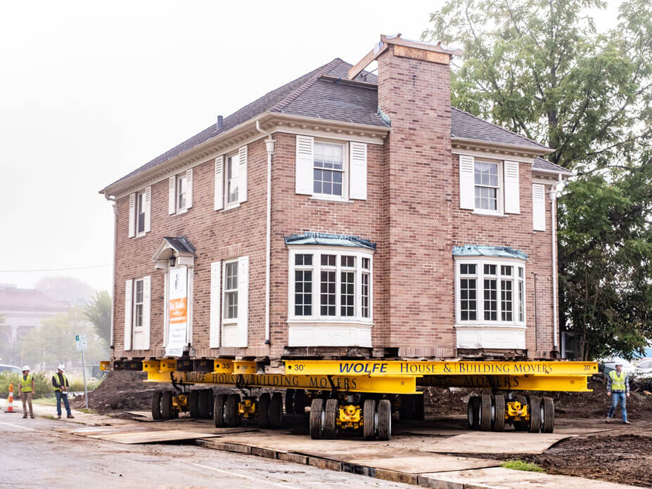 May House pulls out into street