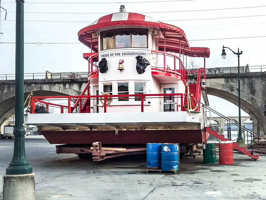 Wolfe set the riverboat down onto its trailer after it was repaired