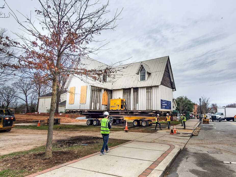 The Ivey-Ellington House sits on dollies ready to pull out into the street