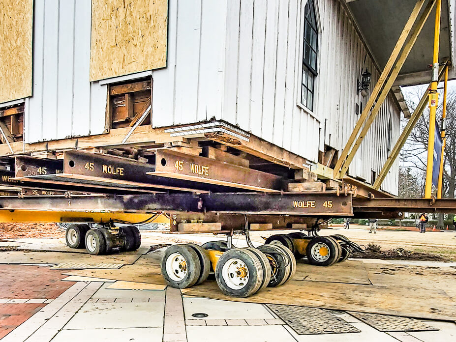 Close-up view of the steel beams and dollies under the Ivey-Ellington House