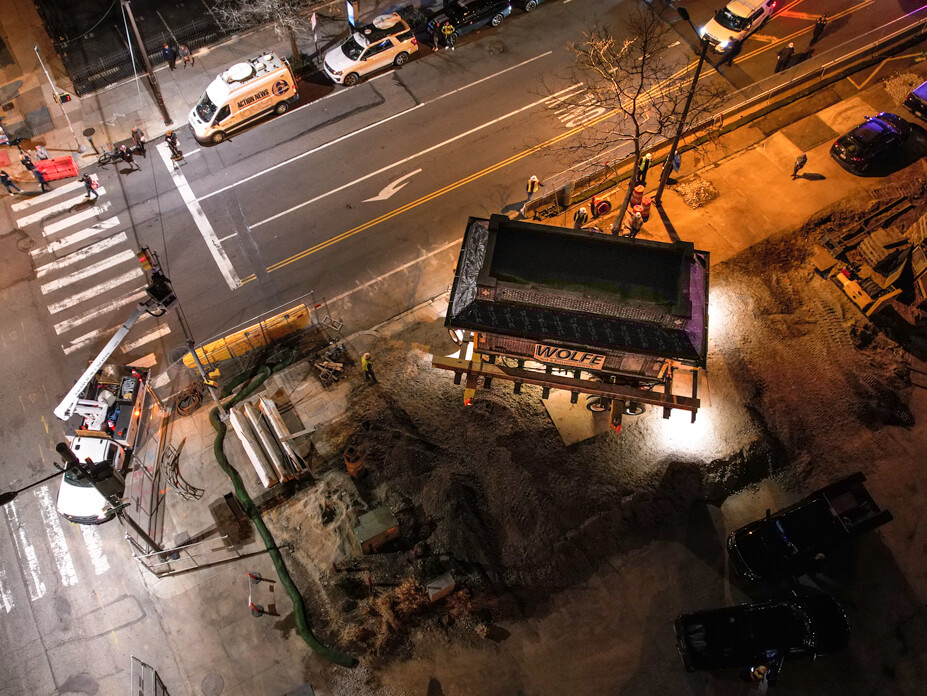 Drone view of Philly gas station being moved into the street