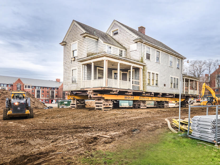 Wolfe excavates around a UConn building sitting on crib priors prior to relocation