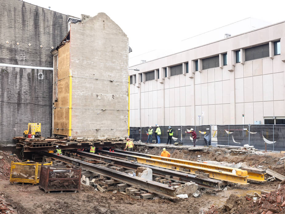 Old First House in final position, with steel roller beams