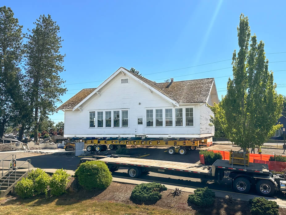 Wolfe foreman drives Carus Schoolhouse to new location