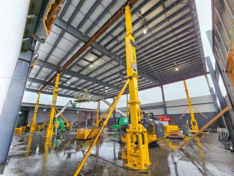 Interior view of Wolfe tower jacks in warehouse roof lift