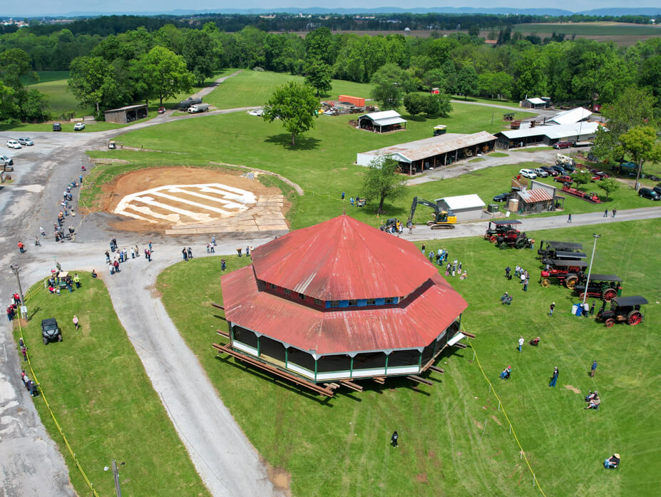 Wolfe drives the Williams Grove carousel house up to the new footers