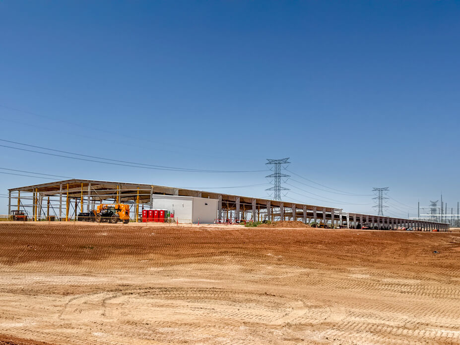 Exterior view of lifted warehouse roof