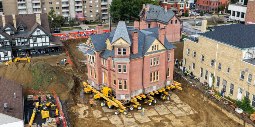 Historic Olds-Norman house being relocated on dollies
